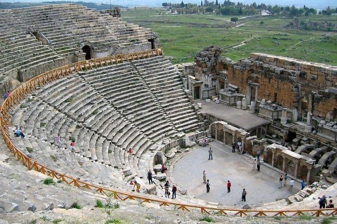 Antalya: Full-Day Pamukkale and Hierapolis Tour & Lunch - Walking through Hierapolis beside the terraces
