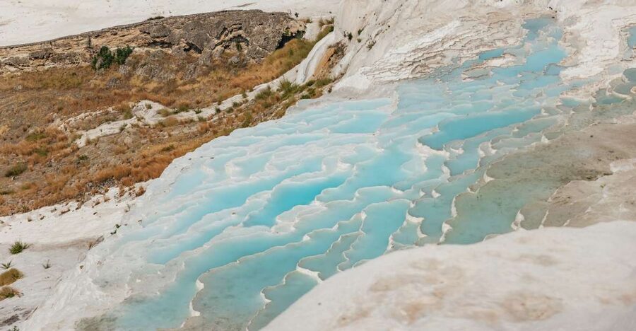 From Antalya/Kemer: Pamukkale and Hierapolis Tour with Lunch - Hierapolis: ruins above the springs