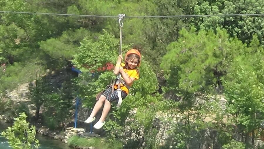Mix Combo Adventure Tour: Zipline, River Rafting, Canyoning - The zipline over the river